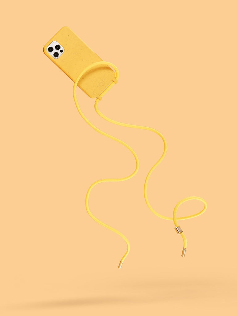 A yellow phone case with a rope on a yellow background